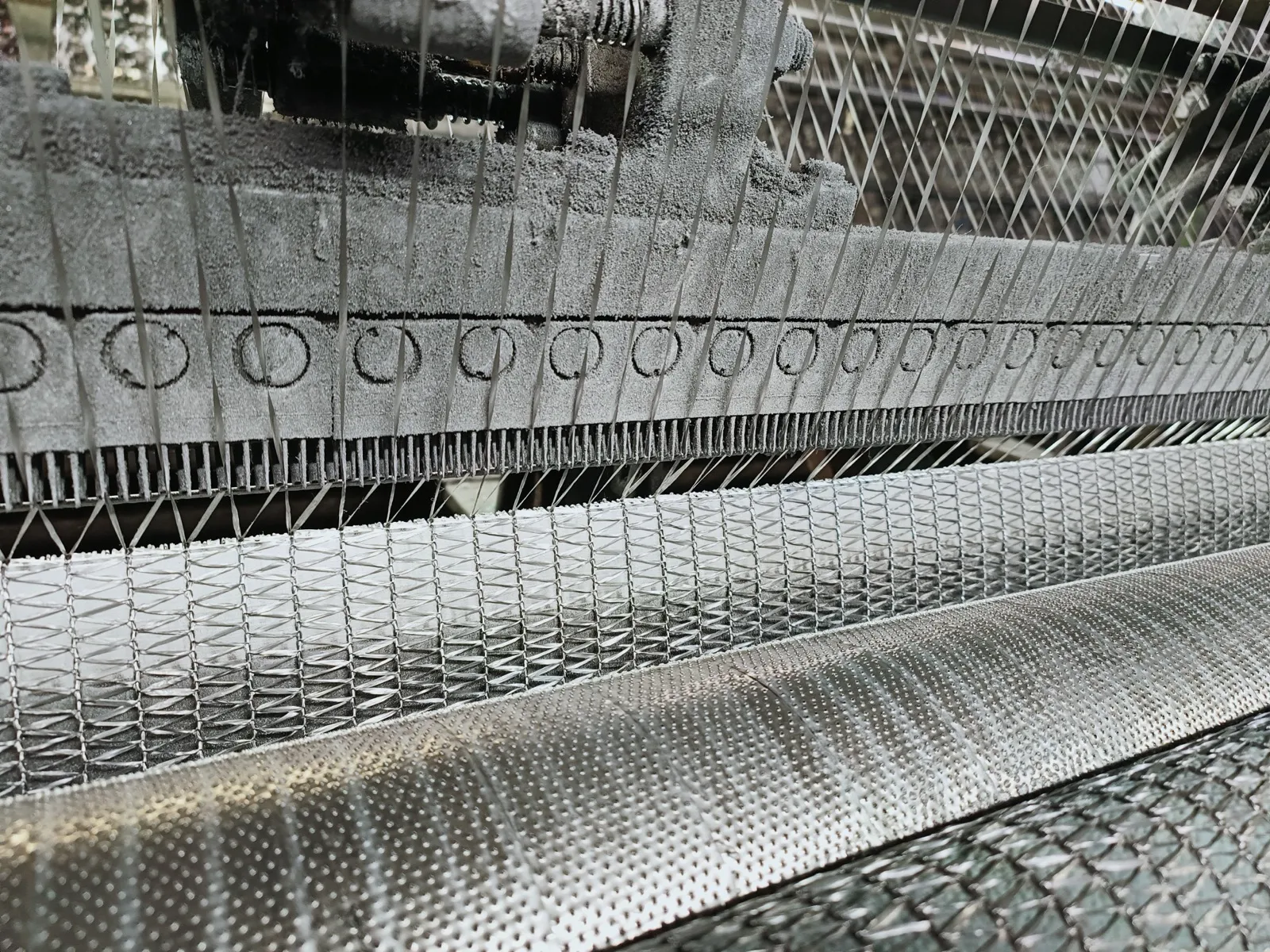 Warp-knitting machine producing HDPE hail netting